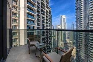 a balcony with a view of a city at Act One Act Two by Emaar, Downtown Dubai in Dubai