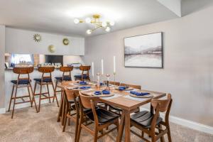 a dining room with a wooden table and chairs at River Bend B212 in Welaka +38 photos
