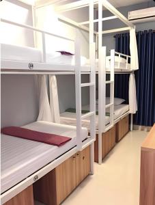Krevet ili kreveti na kat u jedinici u objektu Amy 2 Hostel Hue