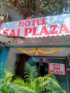 a sign for a hotel calaza in front of a building at Hotel Sai Plaza, Chembur Mumbai in Mumbai