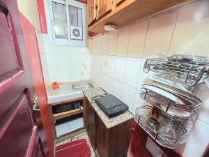 Kuchyň nebo kuchyňský kout v ubytování The Yafé Bastos 12 + 9 fotografií