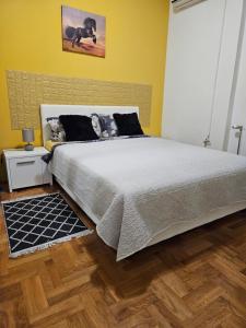 Postel nebo postele na pokoji v ubytování APARTMAN SUNFLOWER