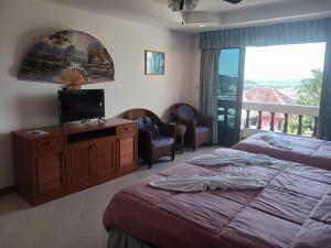 Postel nebo postele na pokoji v ubytování Aksarai hotel
