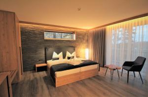 Postel nebo postele na pokoji v ubytování Privat & Boutique Hotel Plauer See