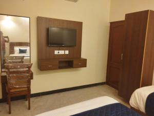 TV a/nebo společenská místnost v ubytování A.R Residency