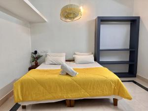 Postel nebo postele na pokoji v ubytování Varkala Villa