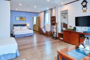 Postel nebo postele na pokoji v ubytování A25 Hotel - 12 Ngô Sỹ Liên