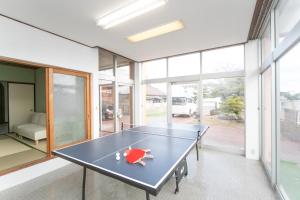 Stolní tenis v ubytování 菰野ガーデンリゾート nebo okolí