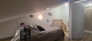 Giường trong phòng chung tại Au coeur du village de Vals