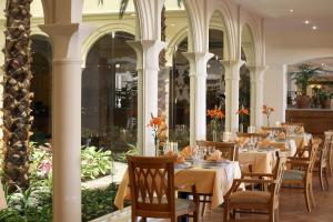 A restaurant or other place to eat at Baron Palms Adults Friendly Only 16 years plus Boutique Hotel Style