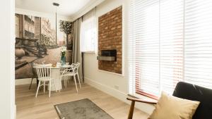 Posedenie v ubytovaní Apartament Ap94