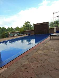 a swimming pool on top of a building at Serene Palace in Nairobi
