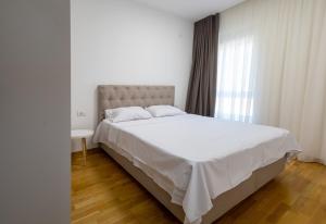 En eller flere senge i et værelse på Status-M apartments154 + 16 billeder