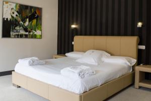 Llit o llits en una habitació de Hotel Teratermal