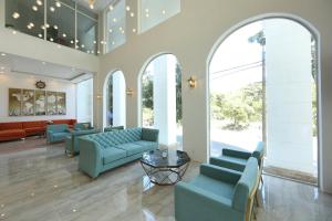 Posezení v ubytování RHM Luxury Hotel And Suite