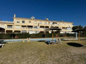 Bazén v ubytování Nuevo Torrox Deluxe Beach & Piscina nebo v jeho okolí