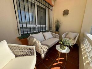 Posezení v ubytování Nuevo Torrox Deluxe Beach & Piscina
