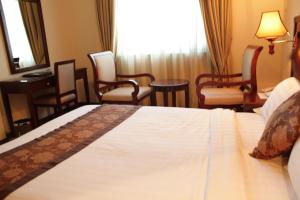 Postel nebo postele na pokoji v ubytování Debredamo Hotel