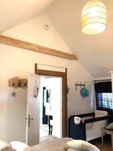 Postel nebo postele na pokoji v ubytování Gîte La Fontaine des Prés