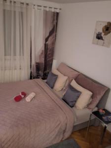 Posteľ alebo postele v izbe v ubytovaní Apartman Sweet penthouse self check-in