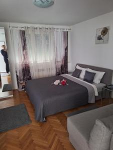Posteľ alebo postele v izbe v ubytovaní Apartman Sweet penthouse self check-in