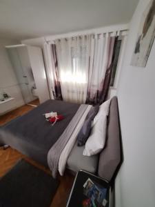 Posteľ alebo postele v izbe v ubytovaní Apartman Sweet penthouse self check-in