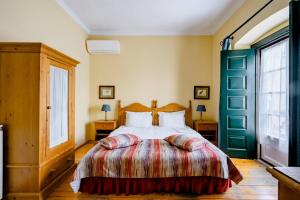Postel nebo postele na pokoji v ubytování Casa da Arvore + 37 fotografií