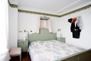 Postel nebo postele na pokoji v ubytování Hotel Reingard