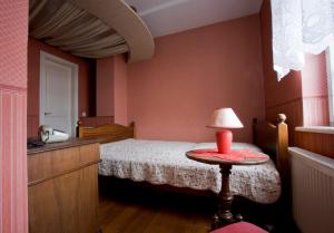 Postel nebo postele na pokoji v ubytování Hotel Reingard