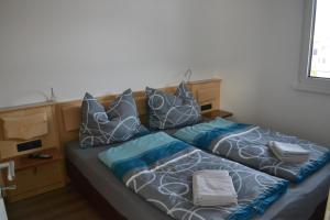 Säng eller sängar i ett rum på Apartment Ausblick