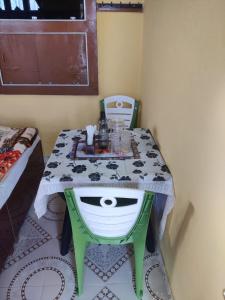 a table in a room with a table with at Gulab - B Homestay in Dehradun