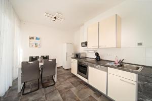 Kuchyň nebo kuchyňský kout v ubytování Appartement 2 - Dünenblick
