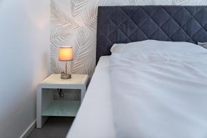 Postel nebo postele na pokoji v ubytování Appartement 2 - Dünenblick