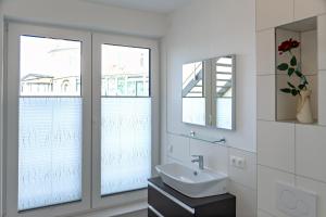 Koupelna v ubytování Appartement 2 - Dünenblick + 17 fotografií
