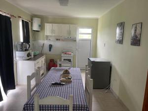 A kitchen or kitchenette at Complejo La Trinidad