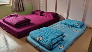 Katil atau katil-katil dalam bilik di Grandpa House 爷爷老家