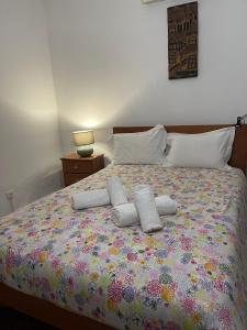 Ένα ή περισσότερα κρεβάτια σε δωμάτιο στο LUZ E SAL by Stay in Alentejo