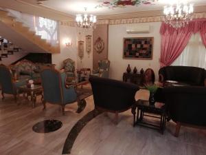 Fotografija v galeriji nastanitve Cheerful standalone villa with pool and waterfall v Kairu