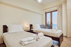 Postel nebo postele na pokoji v ubytování Jessica Luxury Villa