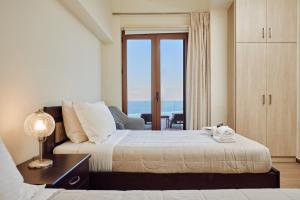 Postel nebo postele na pokoji v ubytování Jessica Luxury Villa + 37 fotografií