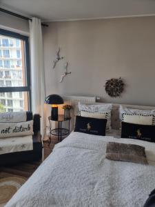 Posteľ alebo postele v izbe v ubytovaní Apartament Prestige & Sea Horyzont 613