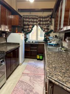 Fotografija v galeriji nastanitve Cheerful standalone villa with pool and waterfall v Kairu
