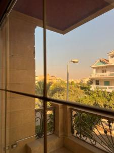 Fotografija v galeriji nastanitve Cheerful standalone villa with pool and waterfall v Kairu