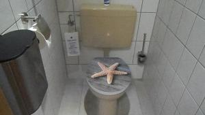 Ένα μπάνιο στο Bichlhof Bärfra Ferienwohnung Am Brunnen +12 φωτογραφίες