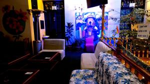 TV a/nebo společenská místnost v ubytování SAINT PETER'S LLAMA HOSTAL