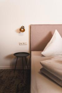 Łóżko lub łóżka w pokoju w obiekcie Hotel Gamshag