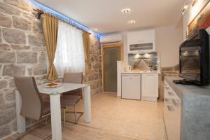 Cucina o angolo cottura di House Sandra 2