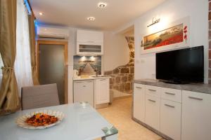 Cucina o angolo cottura di House Sandra 2