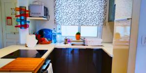 Una cocina o zona de cocina en Unobstructred seaviews, 2BR, Kingbeds, Fully ACd