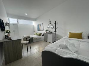 Ένα ή περισσότερα κρεβάτια σε δωμάτιο στο AIOLOS Chania centre luxury apartment